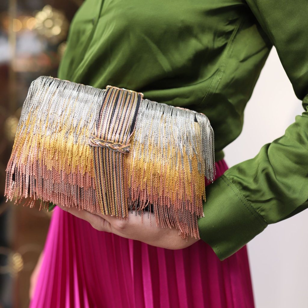 Metallic gold clutch