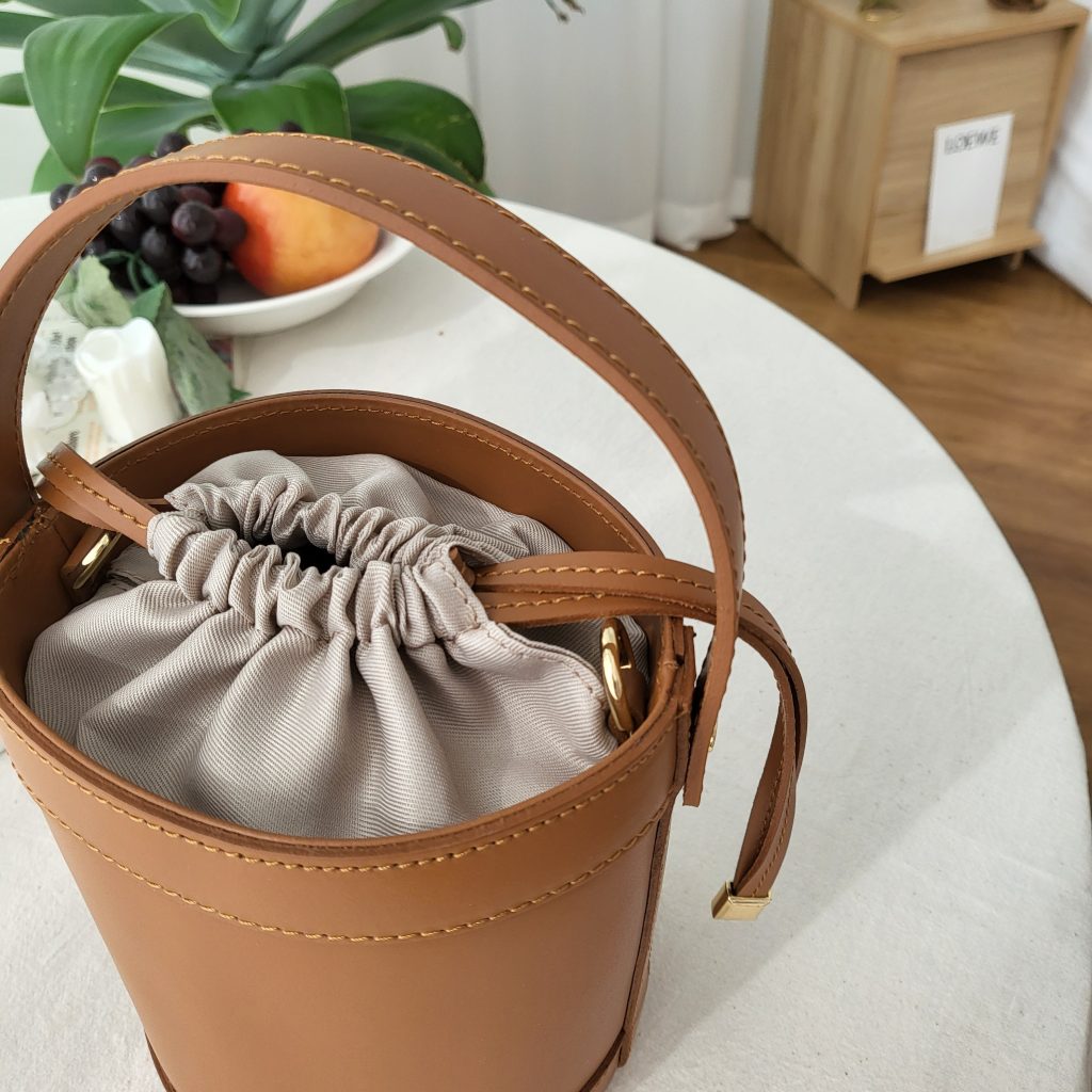 Brown leather bucket bag